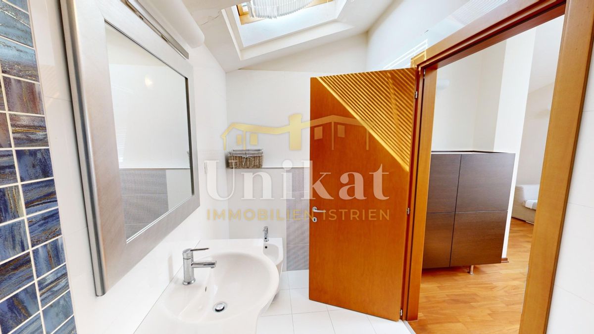 Appartamento su due piani con 4 camere da letto